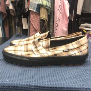 Vans Black and Tan Slip-On Loafers with Canvas Comfort